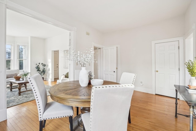 dining room featuring light wood-type flooring