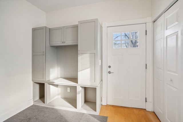 mudroom with light hardwood / wood-style floors