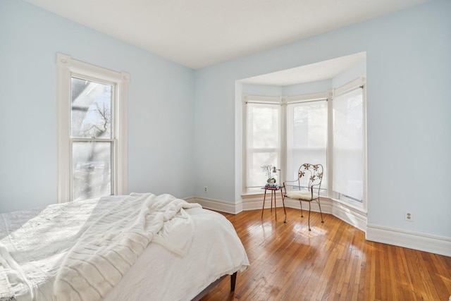 bedroom featuring wood-type flooring