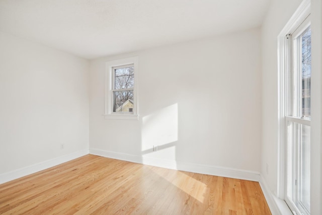 unfurnished room featuring hardwood / wood-style floors