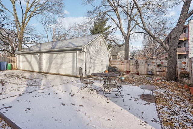 exterior space featuring an outbuilding and a garage