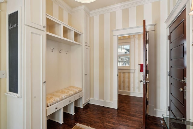 mudroom featuring baseboards, ornamental molding, dark wood-style floors, and wallpapered walls