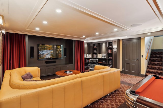 home theater room with crown molding, carpet, a raised ceiling, and recessed lighting