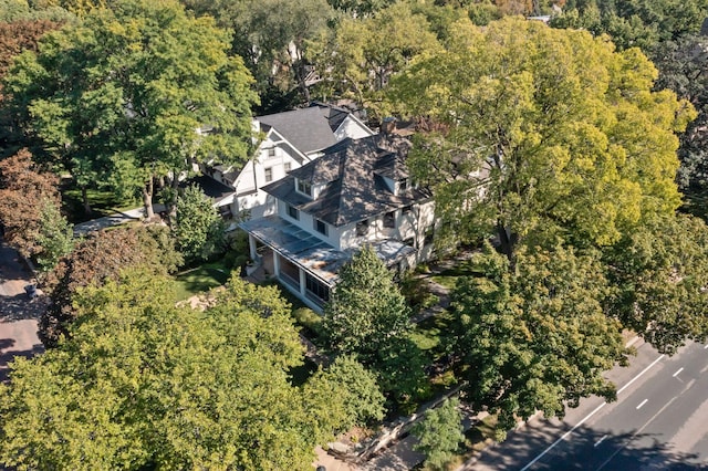 drone / aerial view with a view of trees