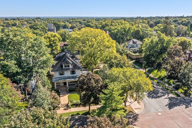 drone / aerial view featuring a view of trees