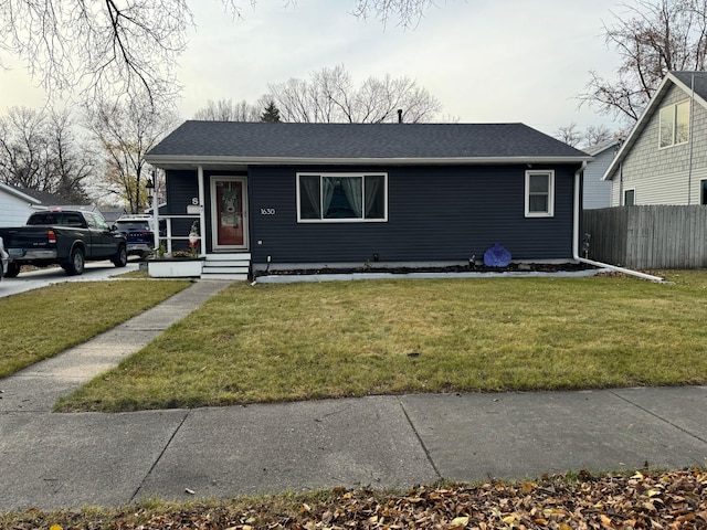 view of front of home with a front yard