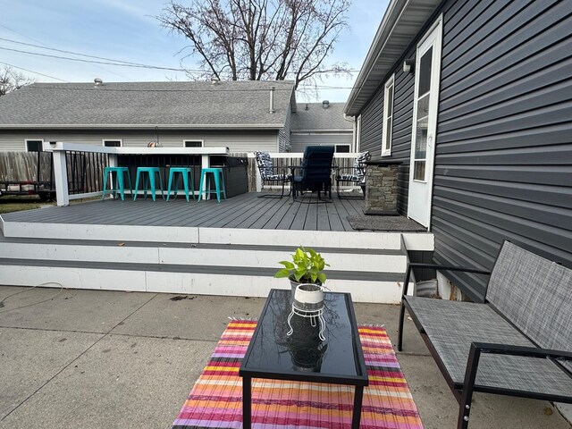 1630 3rd St N, Fargo, ND 58102 - wooden deck with outdoor dining area and a patio