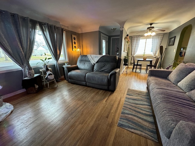 1630 3rd St N, Fargo, ND 58102 - living room featuring wood finished floors, ceiling fan, and arched walkways