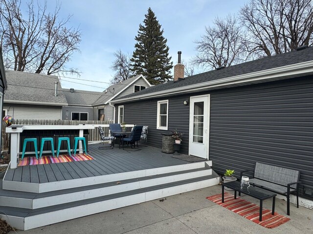 1630 3rd St N, Fargo, ND 58102 - wooden terrace with outdoor dining space