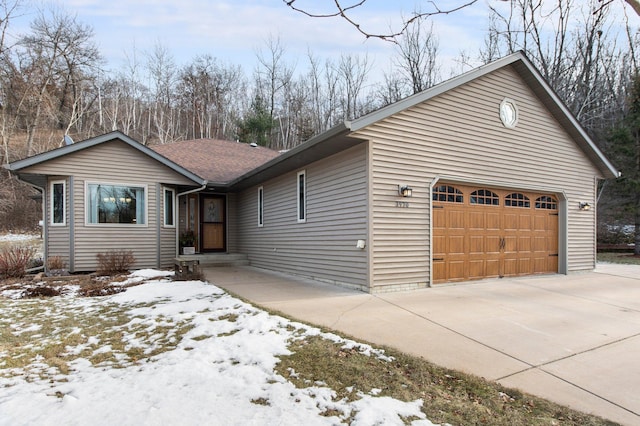 single story home featuring a garage