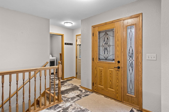 entrance foyer with washer / dryer