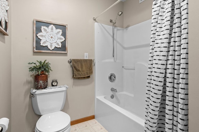 bathroom featuring shower / bathtub combination with curtain and toilet