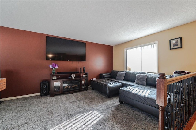 carpeted living room with a textured ceiling