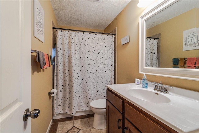 bathroom featuring vanity, tile patterned floors, a shower with shower curtain, toilet, and a textured ceiling