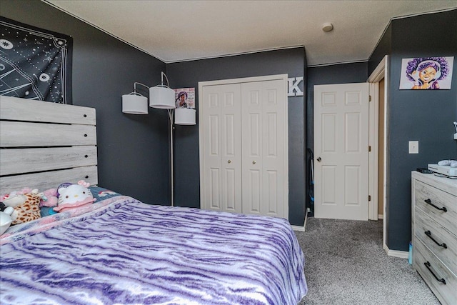 carpeted bedroom with a closet