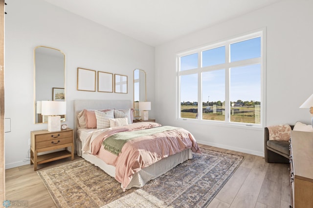 bedroom featuring light hardwood / wood-style flooring