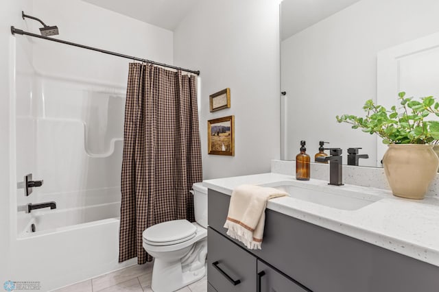 full bathroom with vanity, tile patterned floors, toilet, and shower / tub combo with curtain