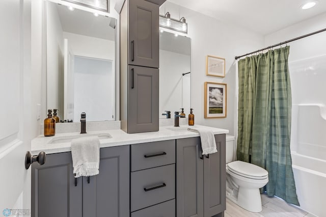 full bathroom with toilet, vanity, and shower / bathtub combination with curtain