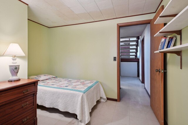 bedroom featuring ornamental molding