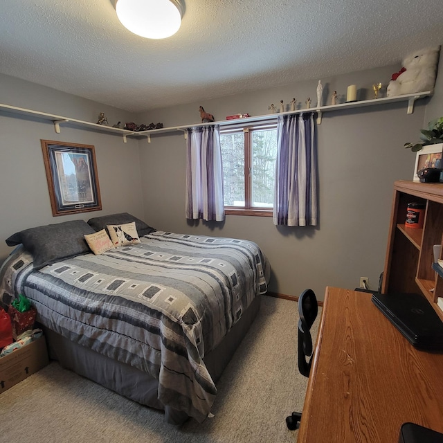 carpeted bedroom with a textured ceiling