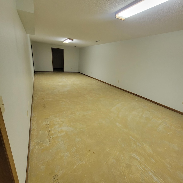 basement with a textured ceiling