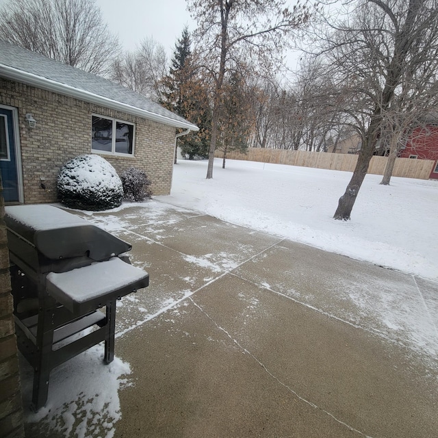 view of snow covered patio