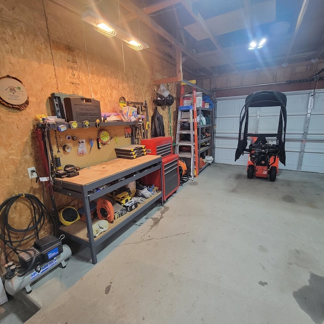 garage featuring a workshop area