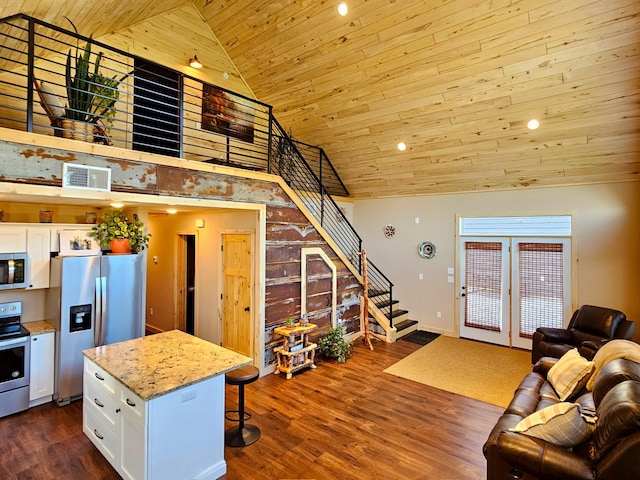 44811 County Highway 14, Perham, MN 56573 - kitchen featuring appliances with stainless steel finishes, wood ceiling, dark wood-type flooring, white cabinets, and a kitchen island