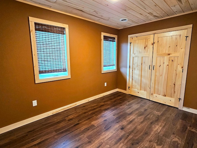 44811 County Highway 14, Perham, MN 56573 - unfurnished bedroom with crown molding, dark hardwood / wood-style flooring, and wooden ceiling
