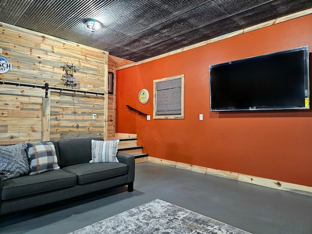 44811 County Highway 14, Perham, MN 56573 - living room featuring wooden walls and concrete floors
