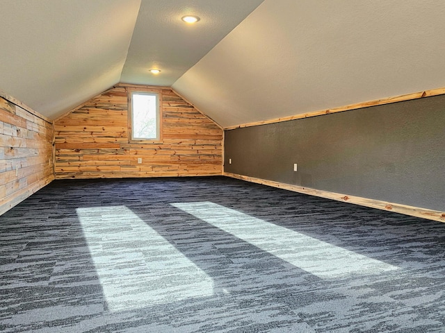 44811 County Highway 14, Perham, MN 56573 - bonus room with dark carpet, lofted ceiling, and wood walls