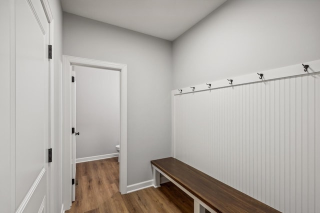 mudroom with light wood-style floors and baseboards