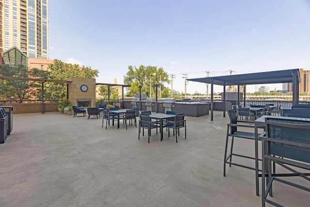 view of patio / terrace featuring a fireplace