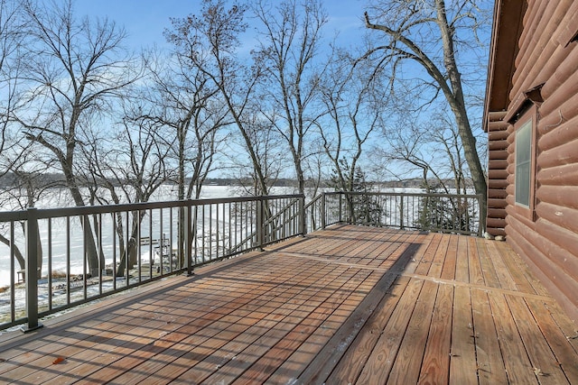 wooden deck with a water view