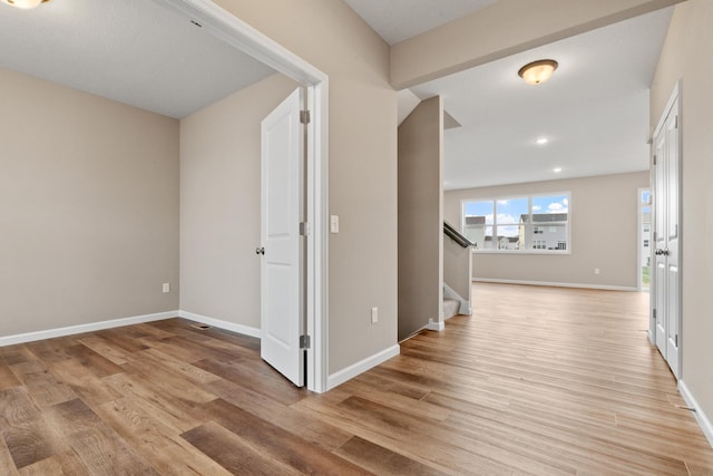 hallway featuring light hardwood / wood-style flooring