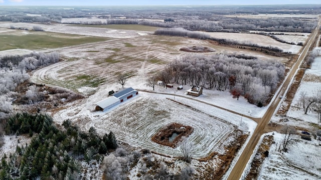 snowy aerial view with a rural view