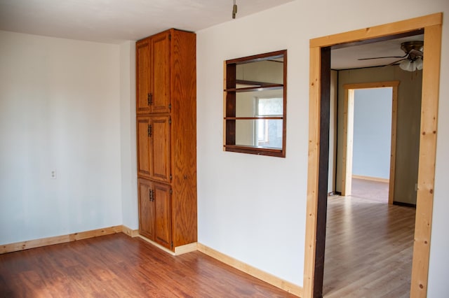 61684 260th St, Hewitt, MN 56453 - empty room featuring baseboards, a ceiling fan, and wood finished floors