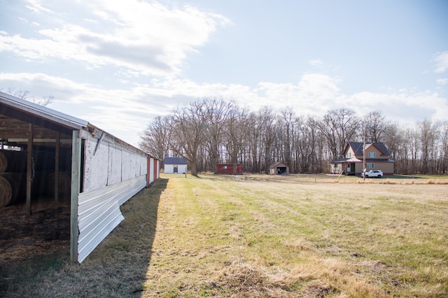 61684 260th St, Hewitt, MN 56453 - view of yard featuring an outdoor structure and a pole building