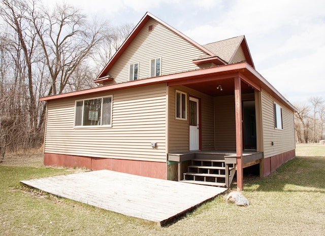 61684 260th St, Hewitt, MN 56453 - rear view of property with a yard and a patio