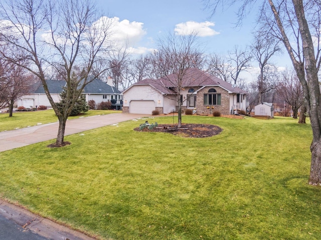 view of front facade featuring a front yard and a garage