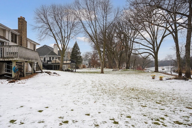 view of yard covered in snow