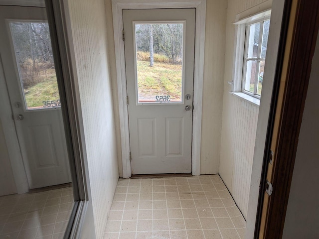 entryway featuring light tile patterned floors