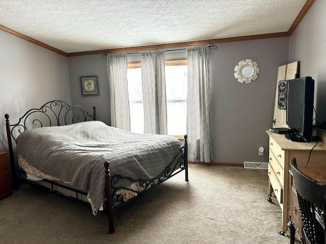 carpeted bedroom featuring crown molding and a textured ceiling