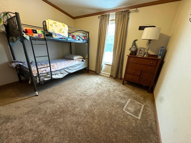 carpeted bedroom with crown molding and a textured ceiling