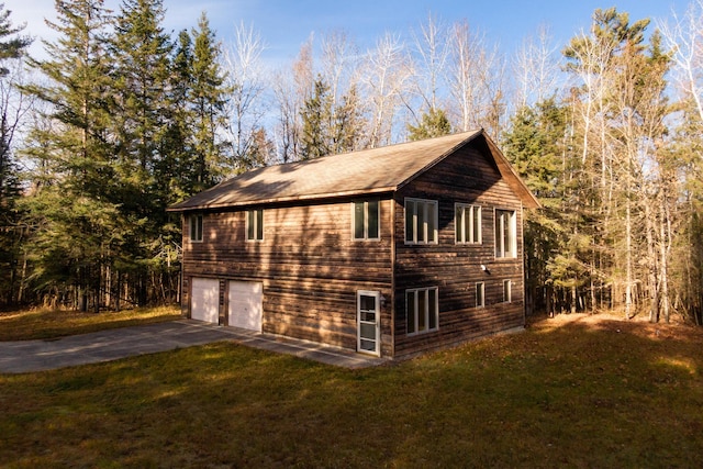 4690 Evergreen Dr NW, Hackensack, MN 56452 - view of property exterior with driveway, a lawn, and roof with shingles