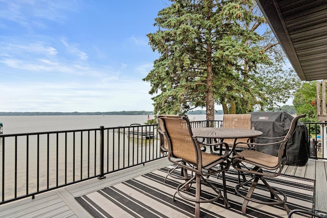 804 County Road I W, Shoreview, MN 55126 - deck featuring outdoor dining space and a water view