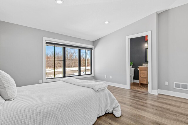 804 County Road I W, Shoreview, MN 55126 - bedroom featuring wood finished floors and recessed lighting