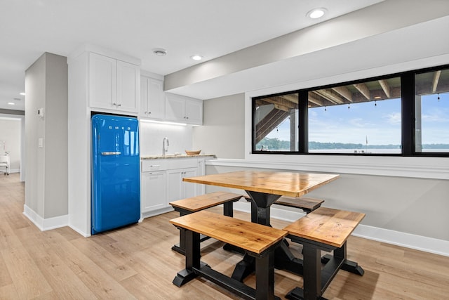 804 County Road I W, Shoreview, MN 55126 - dining area with light wood-type flooring and recessed lighting