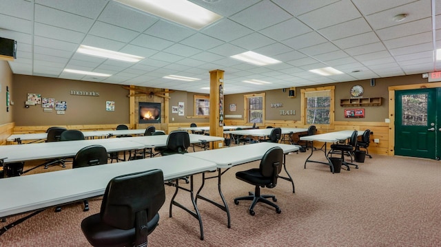 office area with a paneled ceiling and carpet