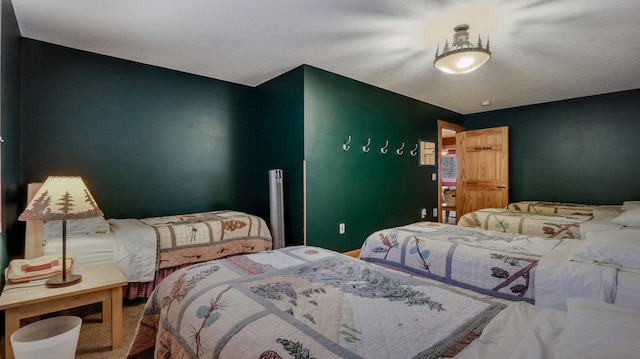 bedroom featuring carpet flooring